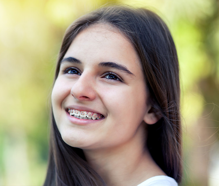  How long does treatment with conventional braces take?